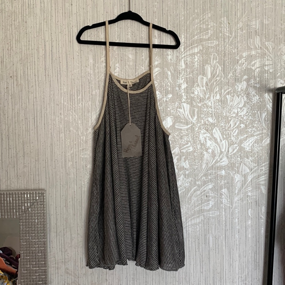Hem and thread size medium black and white stripped boutique tank top